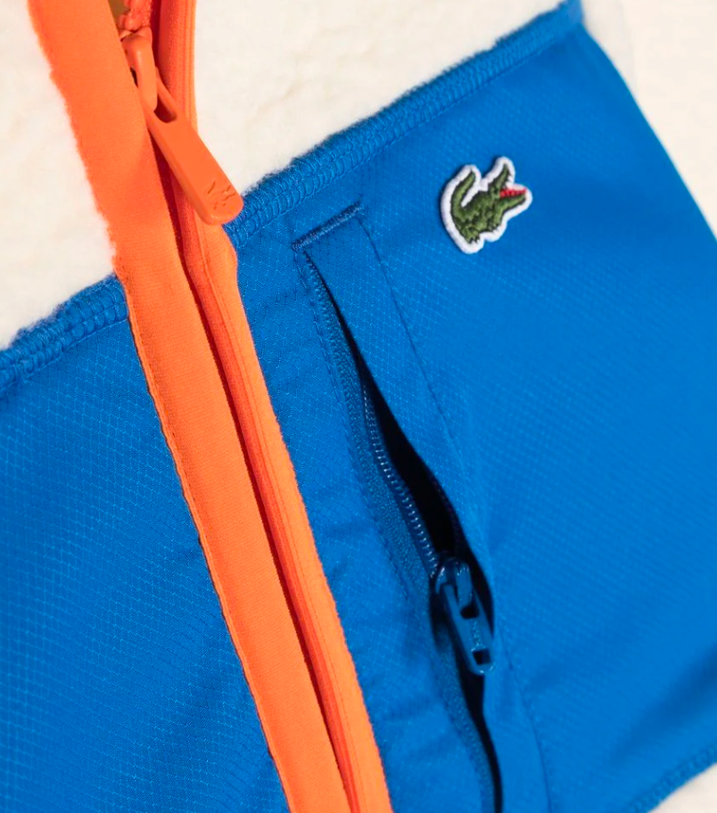 LACOSTE – Blaue, weiße und orangefarbene Fleece-Bomberjacke – 10 Jahre