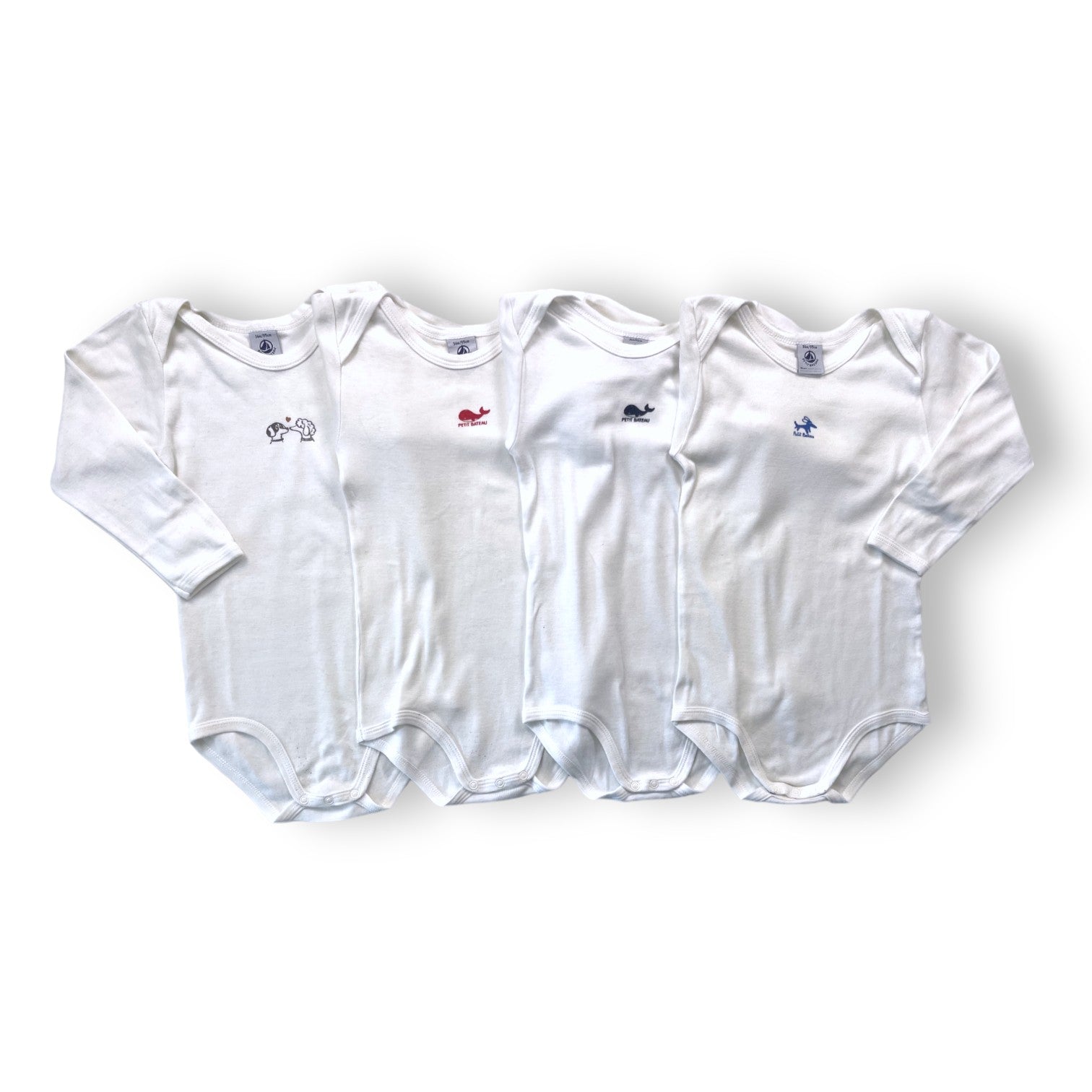 PETIT BATEAU - Set of 4 white bodysuits - 3 years