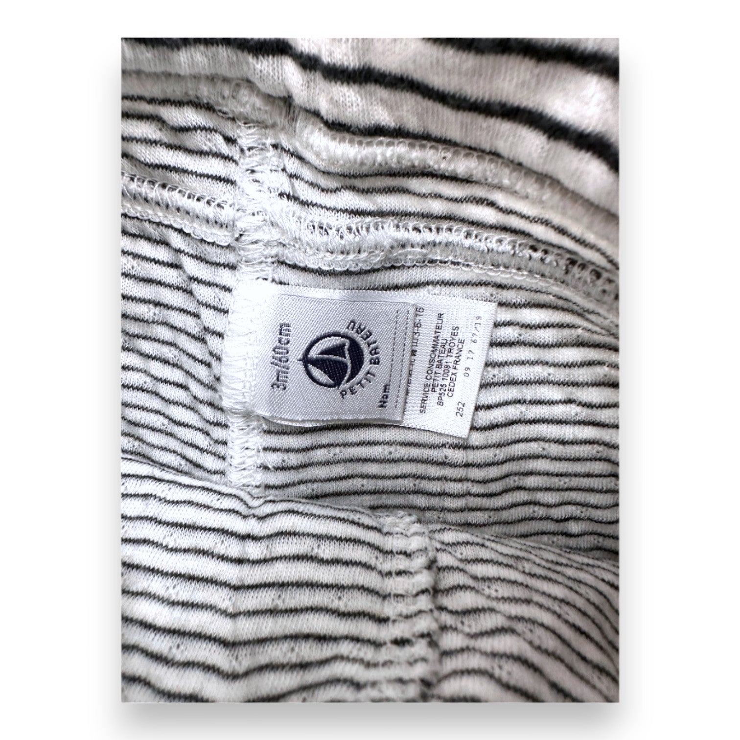 PETIT BATEAU - White and black striped leggings - 3 months