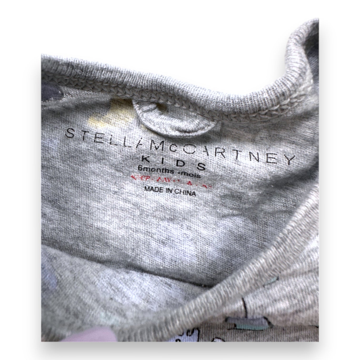 STELLA MCCARTNEY - Gray jumpsuit with prints - 6 months