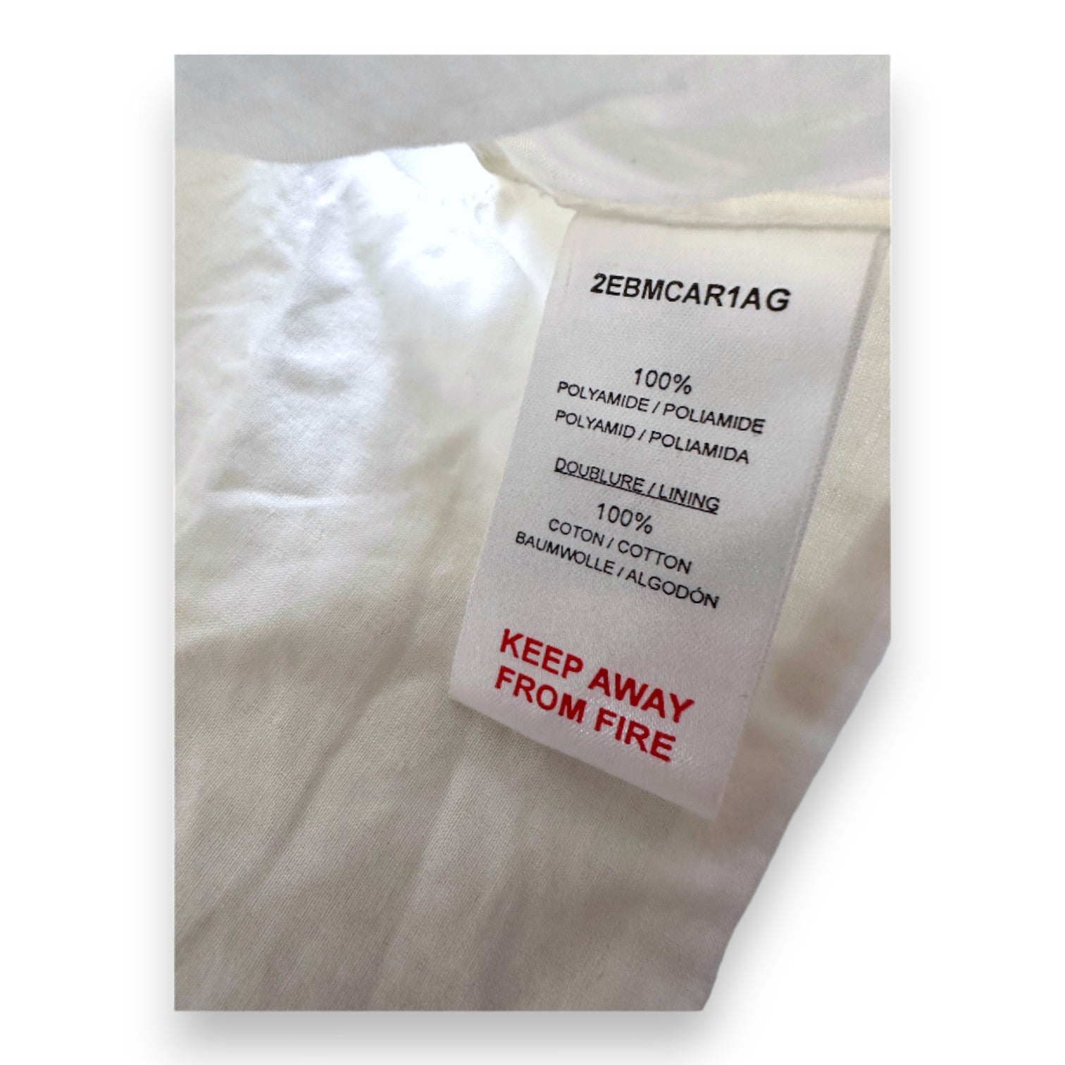 DIOR – Strukturierte weiße ärmellose Strickjacke – 9 Monate